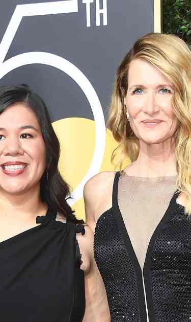 Activist Mónica Ramírez and Laura Dern attend The 75th Annual Golden Globe Awards at The Beverly Hilton Hotel on January 7, 2018 in Beverly Hills, California.  Photo by Frazer Harrison/Getty Images