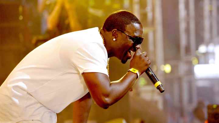 Recording artist Akon performs onstage with DJ Matoma during day 2 of Coachella. Photo by Michael Tullberg/Getty Images for Coachella