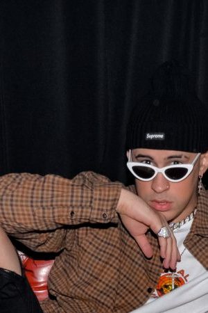Bad Bunny poses backstage at Apple Music. Photo by Manny Hernandez/Getty Images for Apple Music