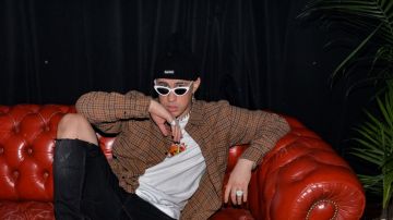 Bad Bunny poses backstage at Apple Music. Photo by Manny Hernandez/Getty Images for Apple Music