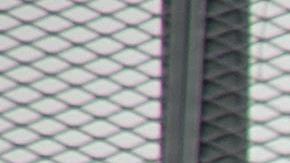 A flag hangs from a highway overpass that reads “Estamos de pie,” in Caguas, Puerto Rico, which is meant to motivate people to stay strong and overcome the disaster left behind Hurricane Maria. Photo by Airman 1st Class Caleb Nunez for  U.S. Air Force. This photo is licensed under CC BY 2.0.
