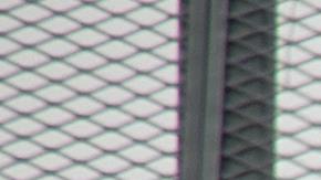 A flag hangs from a highway overpass that reads “Estamos de pie,” in Caguas, Puerto Rico, which is meant to motivate people to stay strong and overcome the disaster left behind Hurricane Maria. Photo by Airman 1st Class Caleb Nunez for  U.S. Air Force. This photo is licensed under CC BY 2.0.