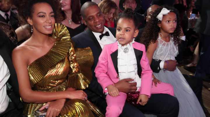 Solange Knowles, hip hop artist Jay-Z and daughter Blue Ivy Carter during The 59th GRAMMY Awards. Photo by Christopher Polk/Getty Images for NARAS