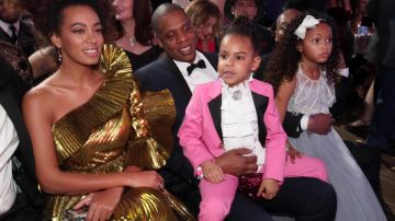Solange Knowles, hip hop artist Jay-Z and daughter Blue Ivy Carter during The 59th GRAMMY Awards. Photo by Christopher Polk/Getty Images for NARAS