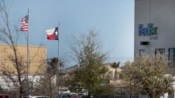 Flags fly outside a FedEx facility following an explosion on March 20, 2018 in Schertz, Texas. Photo by Scott Olson/Getty Images