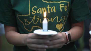 Residents attend a prayer vigil to remember the victims from the Santa Fe High School shooting. Photo by Scott Olson/Getty Images
