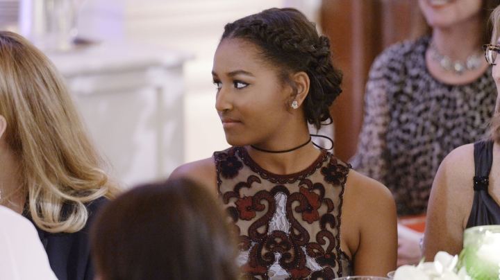 Sasha Obama attends a State Dinner at the White House. Photo by Olivier Douliery-Pool/Getty Images
