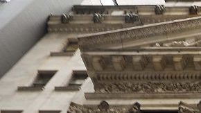 The Spotify banner hangs from the New York Stock Exchange (NYSE) on the morning that the music streaming service begins trading shares. Photo by Spencer Platt/Getty Images