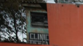 A shopper leaves a supermarket with flour and eggs after waiting for hours for scarce foodstuffs on March 2, 2014 in Caracas, Venezuela. Photo by John Moore/Getty Images