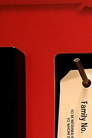 Pictures of people who were incarcerated at Manzanar War Relocation Center are displayed alongside family tags at Manzanar National Historic Site on December 9, 2015 near Independence, California. Photo by Justin Sullivan/Getty Images