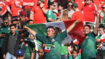 Fans of Mexico cheer during the friendly international soccer match against Wales in Pasadena, California. Photo by Kevork Djansezian/Getty Images