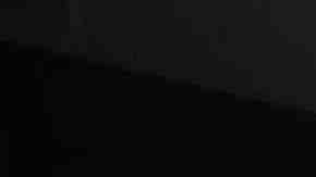 Protesters hold signs as they block Sansome Street during a demonstration outside of the San Francisco office of the Immigration and Customs Enforcement (ICE).  Photo by Justin Sullivan/Getty Images