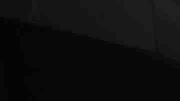 Protesters hold signs as they block Sansome Street during a demonstration outside of the San Francisco office of the Immigration and Customs Enforcement (ICE).  Photo by Justin Sullivan/Getty Images