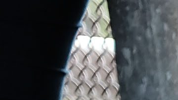 A Honduran girl, fleeing poverty and violence in her home country, waits with her mother along the border bridge after being denied into the Texas city of Brownsville. Photo by Spencer Platt/Getty Images