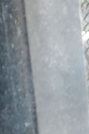 A Honduran girl, fleeing poverty and violence in her home country, waits with her mother along the border bridge after being denied into the Texas city of Brownsville. Photo by Spencer Platt/Getty Images