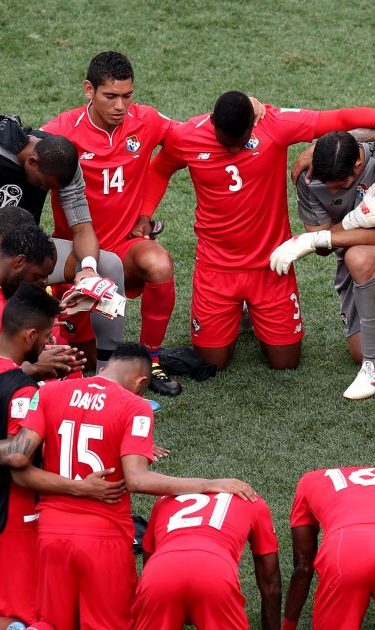 Panama players form a huddle following the 2018 FIFA World Cup match between England and Panama. Photo by Clive Brunskill/Getty Images