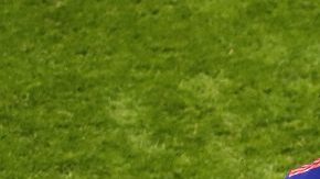 Yerry Mina of Colombia celebrates with teammate Juan Cuadrado after scoring his team's first goal during the 2018 FIFA World Cup. (Photo by Julian Finney/Getty Images)