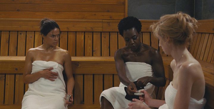 Michelle Rodriguez, Viola Davis, and Elizabeth Debicki star in 'Widows.' Photo courtesy of Twentieth Century Fox.