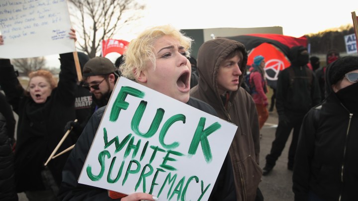 Demonstrators clash with police before the start of a speech by white nationalist Richard Spencer. Photo by Scott Olson/Getty Images
