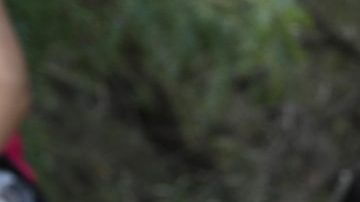 Central American asylum seekers wait as U.S. Border Patrol agents take them into custody on June 12, 2018. Photo by John Moore/Getty Images