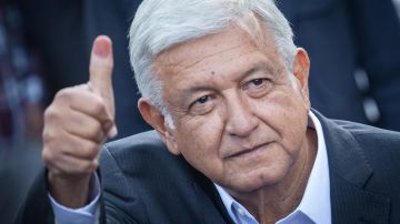 Andres Manuel Lopez Obrador waves after voting as part of the Mexico 2018 Presidential Election on July 1, 2018 in Mexico City, Mexico. Photo by Pedro Mera/Getty Images