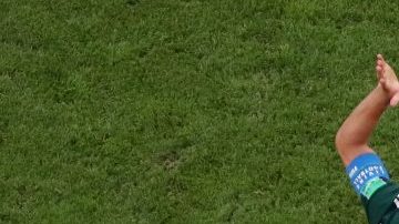 Neymar Jr of Brazil lies on the pitch injured during 2018 World Cup match with Mexico.  (Photo by Clive Rose/Getty Images)