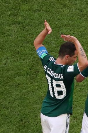 Neymar Jr of Brazil lies on the pitch injured during 2018 World Cup match with Mexico.  (Photo by Clive Rose/Getty Images)