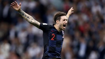 Sime Vrsaljko of Croatia celebrates victory after the 2018 FIFA World Cup Russia Semi Final match between England and Croatia at Luzhniki Stadium on July 11, 2018 in Moscow, Russia. Photo by Ryan Pierse/Getty Images