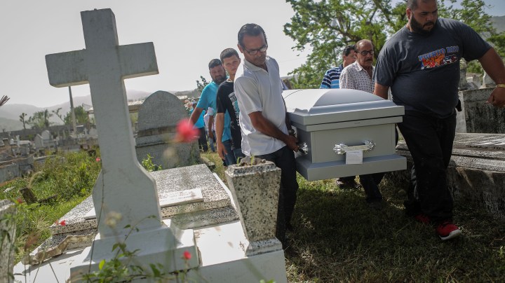 Mourners carry the casket of Wilfredo Torres Rivera, 58, who died October 13 after jumping off a bridge into a lake, three weeks after Hurricane Maria.