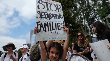A young demonstrator participates in the Families Belong Together - Freedom For Immigrants March at Los Angeles City Hall. Photo by Sarah Morris/Getty Images