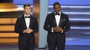 Colin Jost (L) and Michael Che speak onstage during 70th Emmy Awards on September 17, 2018 in Los Angeles, California. Photo by Kevin Winter/Getty Images