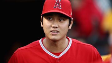 Shohei Ohtani #17 of the Los Angeles Angels walks out to the field for their game against the Oakland Athletics at Oakland. Photo by Ezra Shaw/Getty Images