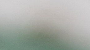 Center prepares to hike the football to the quarterback. Photo by 	fstop123/ E+