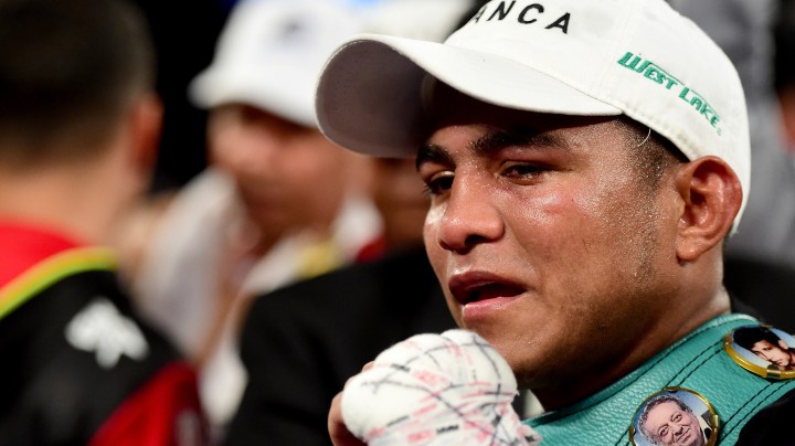 Roman Gonzalez poses with his belt after a unanimous 12 round decision over McWilliams Arroyo during a WBC flyweight title fight at The Forum on April 23, 2016 in Inglewood, California. Photo by Harry How/Getty Images