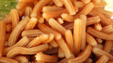 Churro. Typical sweet of breakfast in Spain. Photo by japatino/Getty Images