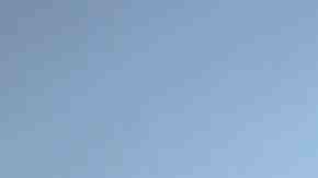 Mother Isamar holds her baby Saniel, 9 months, at their makeshift home, under reconstruction, after being mostly destroyed by Hurricane Maria, on December 23, 2017 in San Isidro, Puerto Rico. Photo by Mario Tama/Getty Images