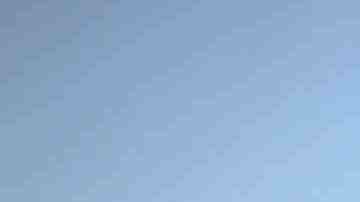 Mother Isamar holds her baby Saniel, 9 months, at their makeshift home, under reconstruction, after being mostly destroyed by Hurricane Maria, on December 23, 2017 in San Isidro, Puerto Rico. Photo by Mario Tama/Getty Images