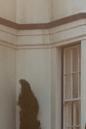 Jack (Lin-Manuel Miranda) Mary Poppins (Emily Blunt) and the Banks children with a crew of street lamplighters at 17 Cherry Tree Lane in 'Mary Poppins Returns.' Courtesy of Disney