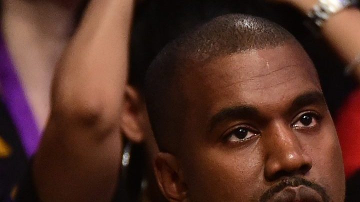 Kanye West looks on as he watches as the Los Angeles Lakers take on the Utah Jazz at Staples Center on April 13, 2016 in Los Angeles, California. Photo by Harry How/Getty Images