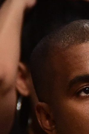 Kanye West looks on as he watches as the Los Angeles Lakers take on the Utah Jazz at Staples Center on April 13, 2016 in Los Angeles, California. Photo by Harry How/Getty Images