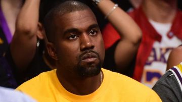 Kanye West looks on as he watches as the Los Angeles Lakers take on the Utah Jazz at Staples Center on April 13, 2016 in Los Angeles, California. Photo by Harry How/Getty Images