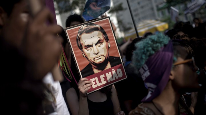 Protesters carry posters against the far-right’s presidential candidate on September 29, 2018 in Sao Paulo, Brazil. Photo by Victor Moriyama/Getty Images