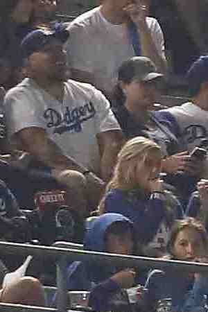 A banner with the words 'Trans People Deserve to Live' is displayed during Game Five of the 2018 World Series. Photo by Sean M. Haffey/Getty Images