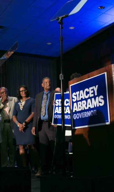 Georgia Democratic Gubernatorial candidate Stacey Abrams takes the stage to declare victory in the primary during an election night. Photo by Jessica McGowan/Getty Images