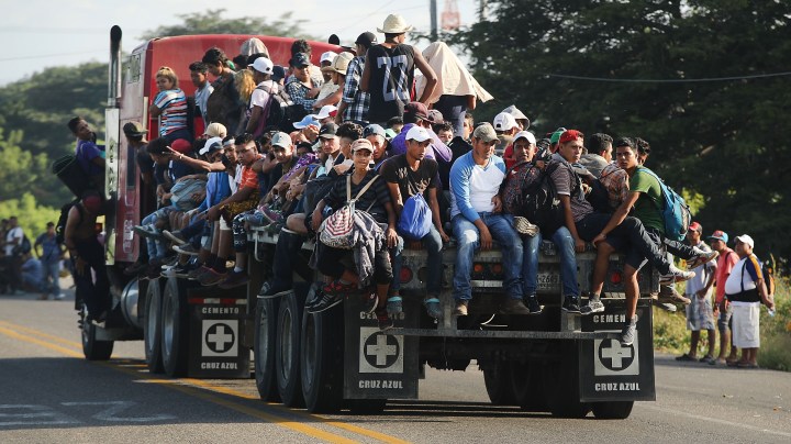 Members of the Central American caravan head out at dawn for their next destination on November 01, 2018 in Juchitan de Zaragoza, Mexico. Photo by Spencer Platt/Getty Images