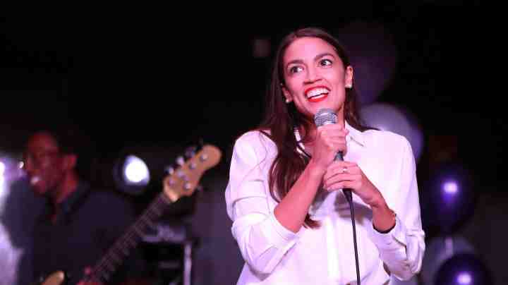 Alexandria Ocasio-Cortez addresses the crowd gathered at La Boom night club in Queens on November 6, 2018. (Photo by Rick Loomis/Getty Images)