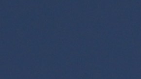 An anti-immigrant protester holds a "Mexico First!" sign before marching with fellow demonstrators to an immigrant shelter on November 18, 2018.  Photo by John Moore/Getty Images