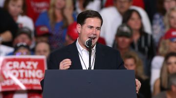 Arizona Gov. Doug Ducey speaks during a rally for President Donald Trump at the International Air Response facility on October 19, 2018 in Mesa, Arizona.  Photo by Ralph Freso/Getty Images