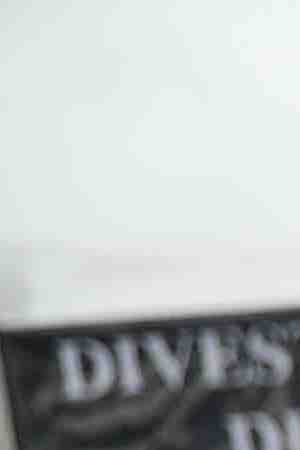 Protesters carry signs as they march during a demonstration against the Dakota Access Pipeline on March 10, 2017 in Washington, DC. Thousands of protesters and members of Native nations marched in Washington DC to oppose the construction of the proposed 1,172 Dakota Access Pipeline that runs within a half-mile of the Standing Rock Sioux reservation in North Dakota. Photo by Justin Sullivan/Getty Images