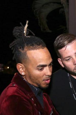 Ozuna with manager Vicente Saavedra and Jimmy Fallon in Puerto Rico. Courtesy of Dímelo Vi